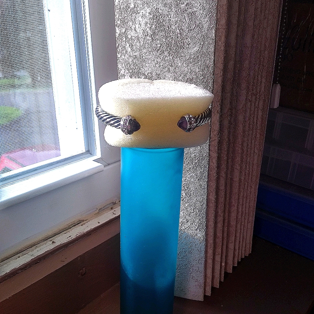 Silvertone bangle with faux amethyst